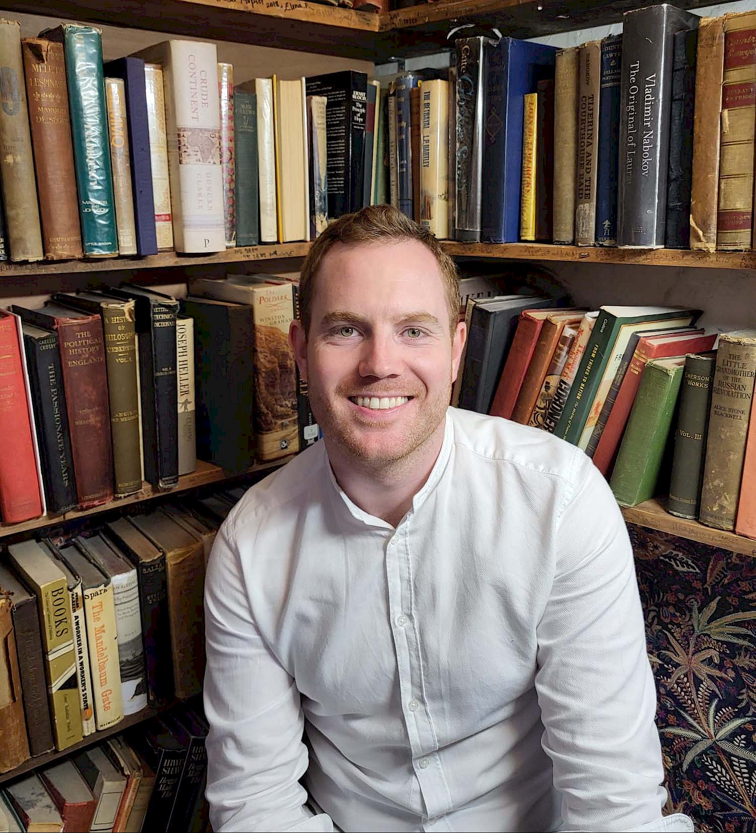 Andrew Cusack promoted to Associate